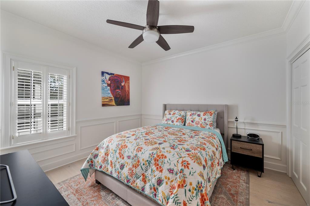 1909 New Jersey Road Lakeland, FL 33803 - Photo 57 of 93 a bedroom with a large bed and a window