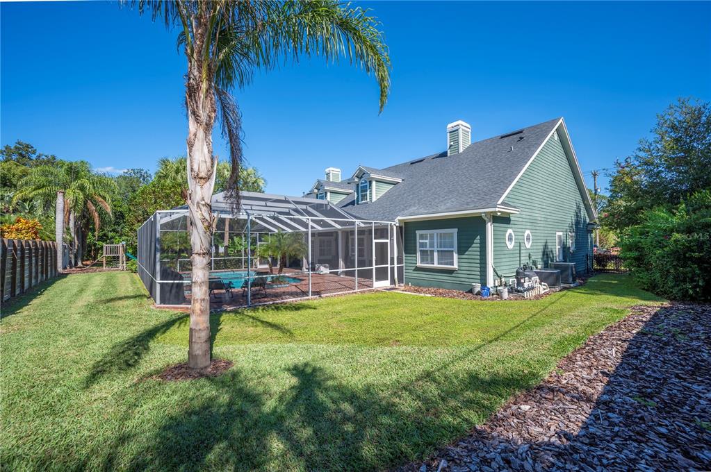 1909 New Jersey Road Lakeland, FL 33803 - Photo 78 of 93 a view of a house with a yard porch and sitting area