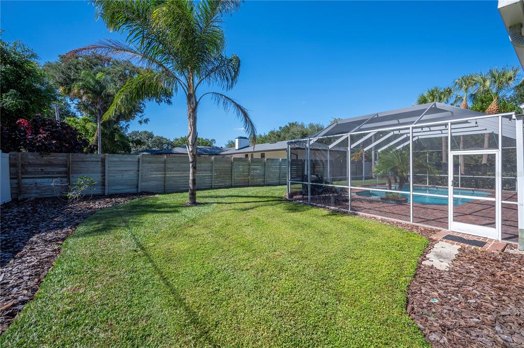 1909 New Jersey Road Lakeland, FL 33803 - Photo 80 of 93 a view of a backyard with a garden