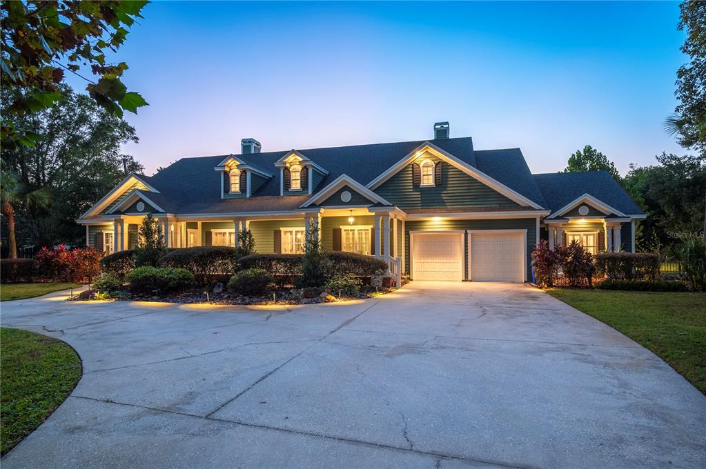 1909 New Jersey Road Lakeland, FL 33803 - Photo 83 of 93 a front view of a house with a yard