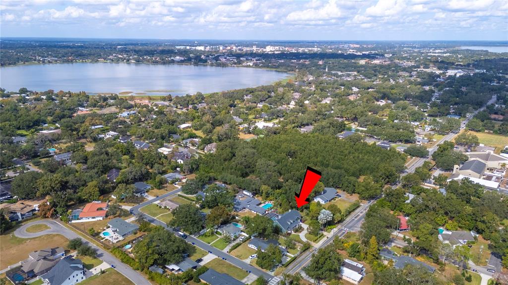 1909 New Jersey Road Lakeland, FL 33803 - Photo 90 of 93 an aerial view of residential building with outdoor space and lake view
