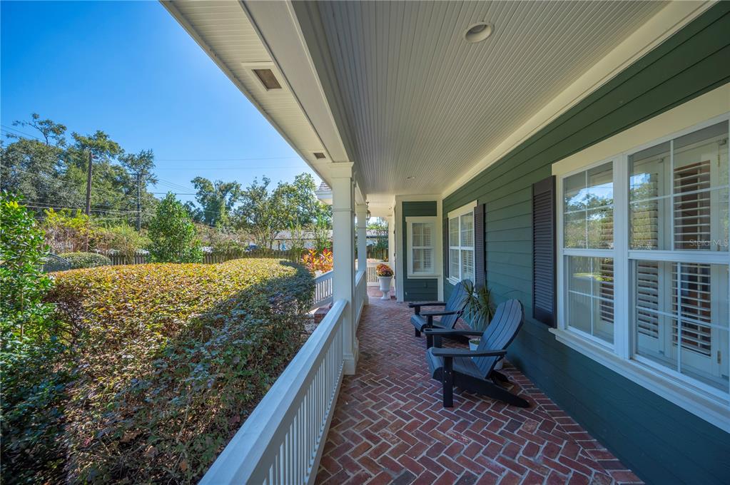1909 New Jersey Road Lakeland, FL 33803 - Photo 10 of 93 a balcony with chairs and a table