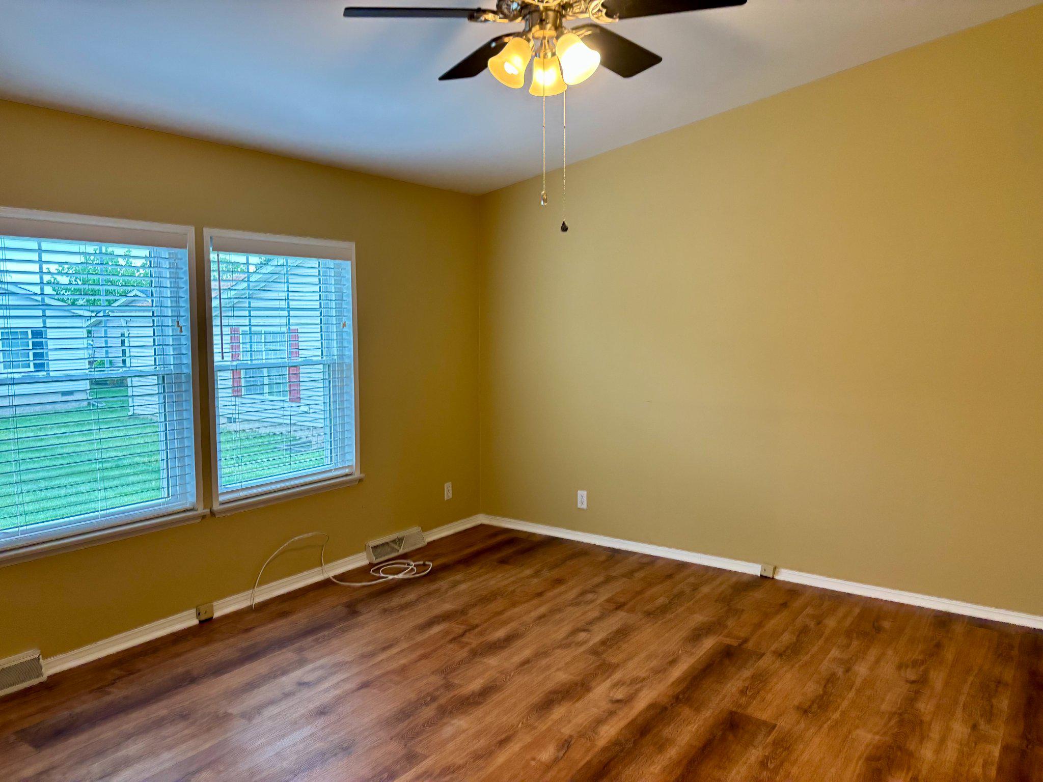 399 Spring Meadow Circle New Hope, PA 18938 - Photo 18 of 37 a view of a room with a window and wooden floor
