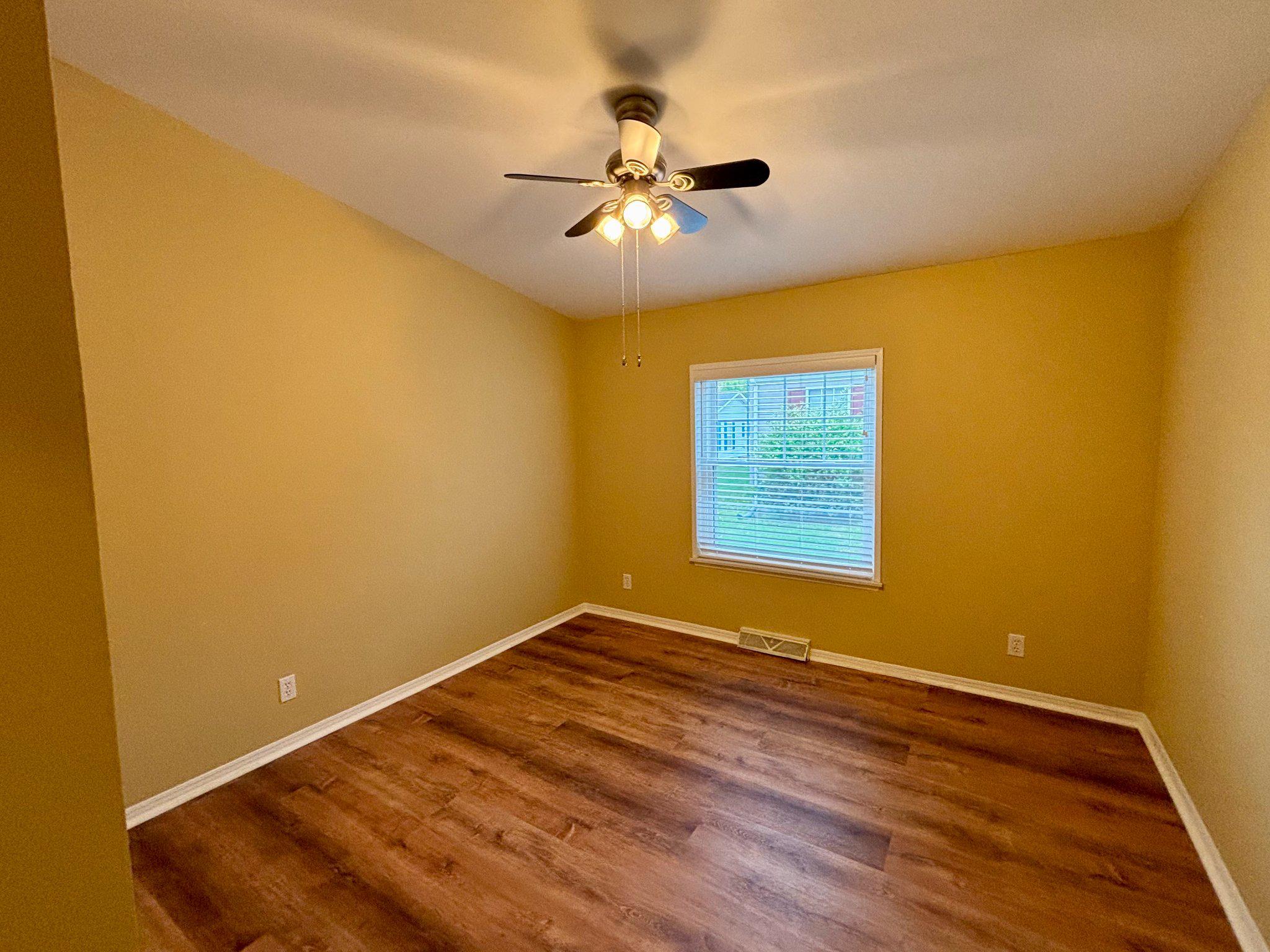 399 Spring Meadow Circle New Hope, PA 18938 - Photo 24 of 37 a view of empty room with wooden floor