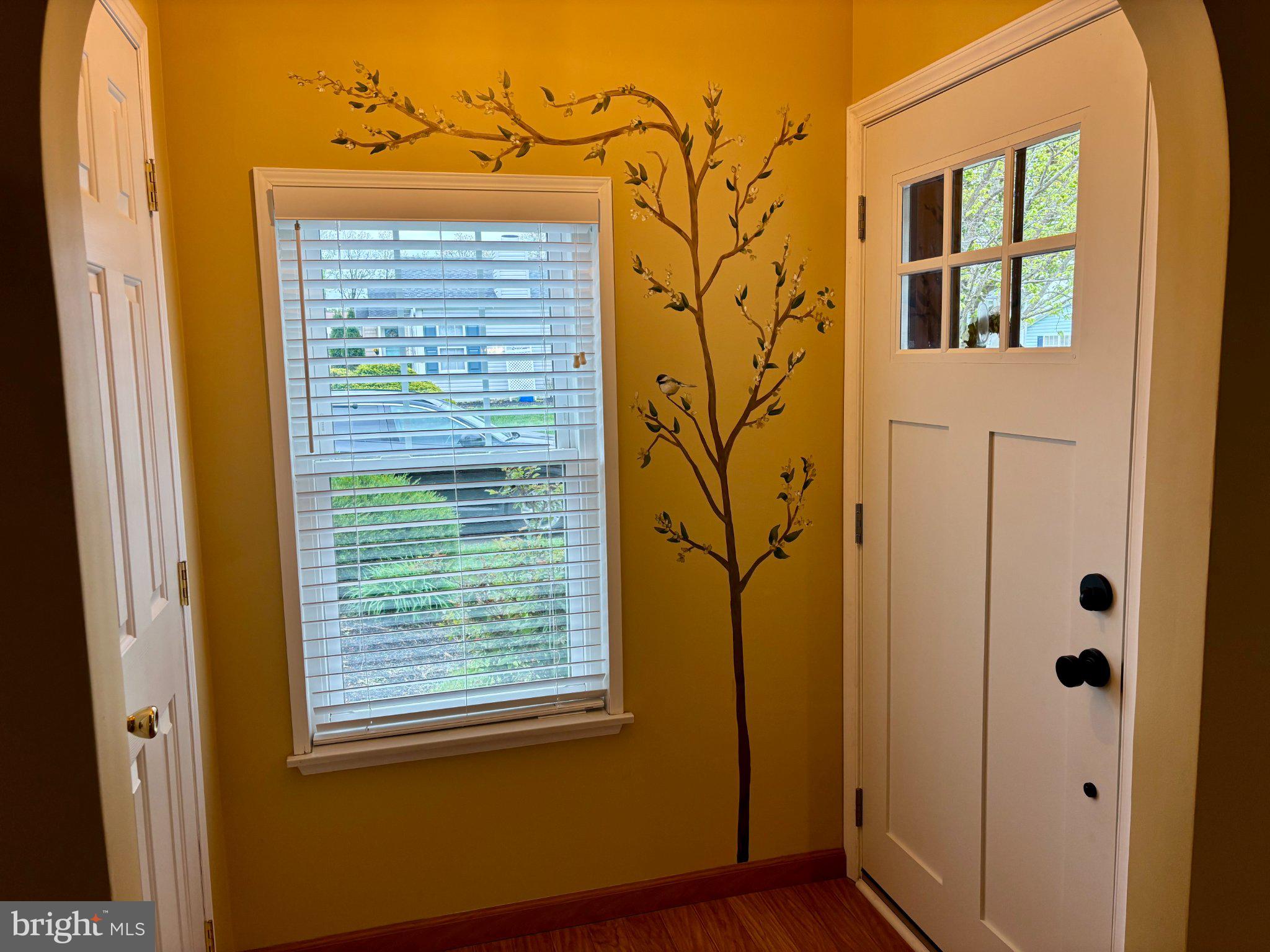 399 Spring Meadow Circle New Hope, PA 18938 - Photo 9 of 37 a view of a house with entryway and wooden floor