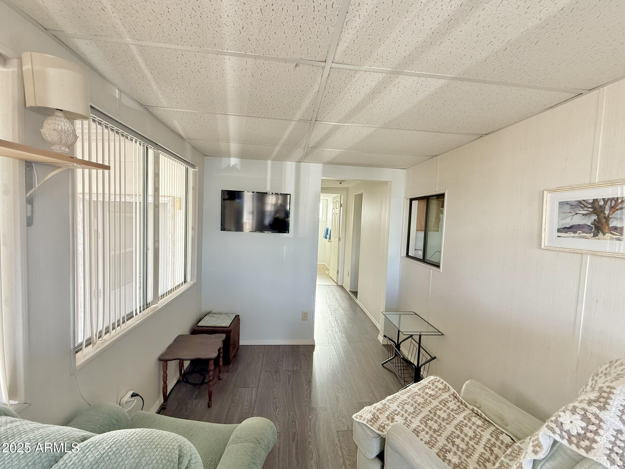 8865 East Baseline Road, Unit 1643 Mesa, AZ 85209 - Photo 11 of 44 a living room with furniture and a window