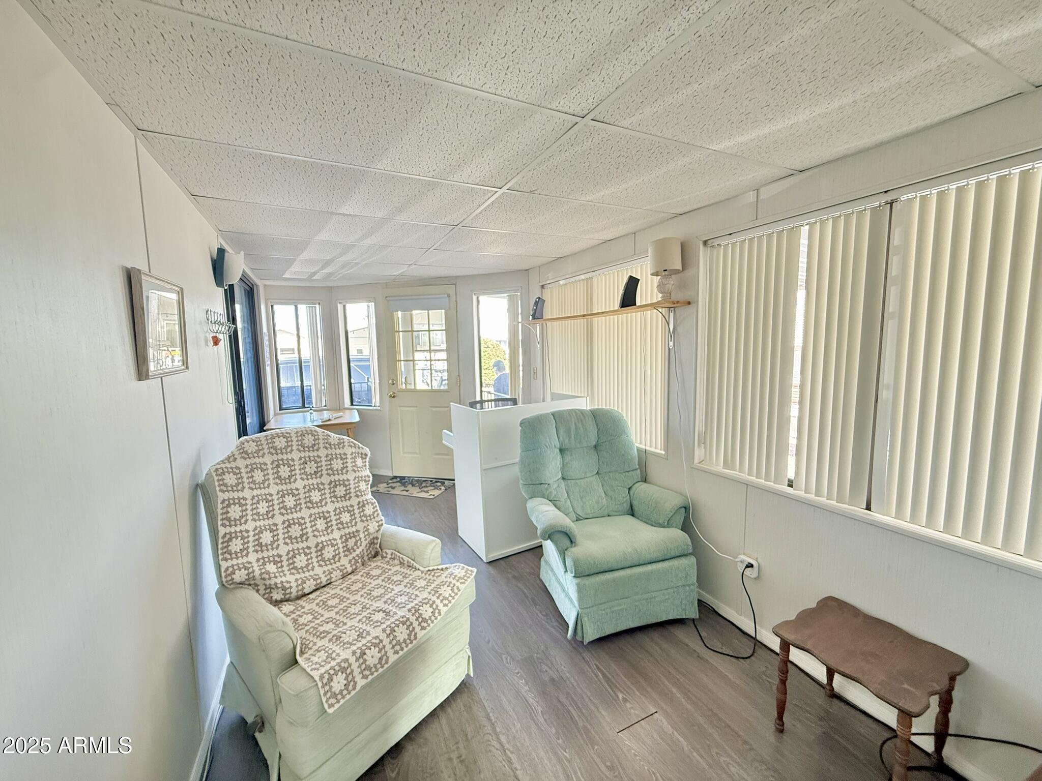 8865 East Baseline Road, Unit 1643 Mesa, AZ 85209 - Photo 12 of 44 a living room with furniture and a window