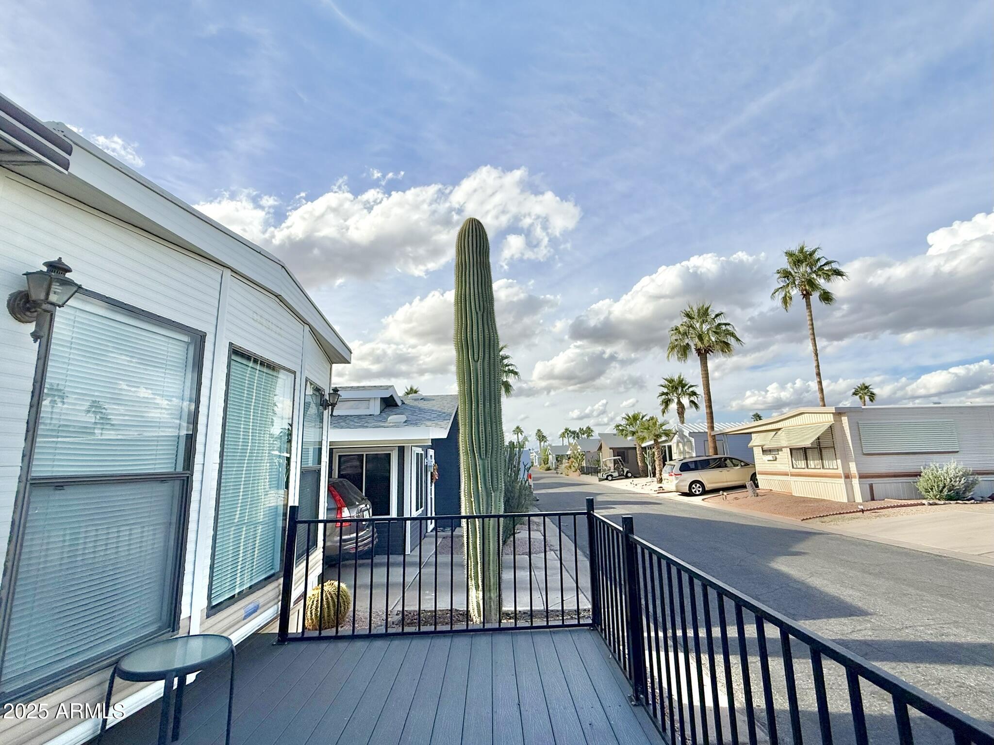 8865 East Baseline Road, Unit 1643 Mesa, AZ 85209 - Photo 22 of 44 a view of a balcony with furniture