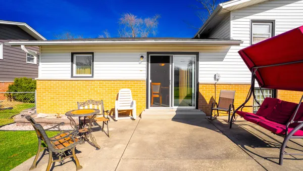 a view of a swimming pool with a lounge chairs