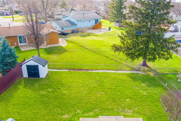 a view of a swimming pool with a lake view