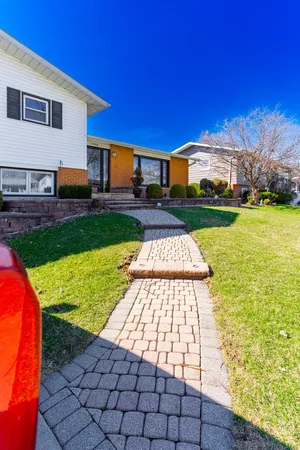 a front view of house with yard