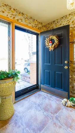 a view of a entryway door front of a house
