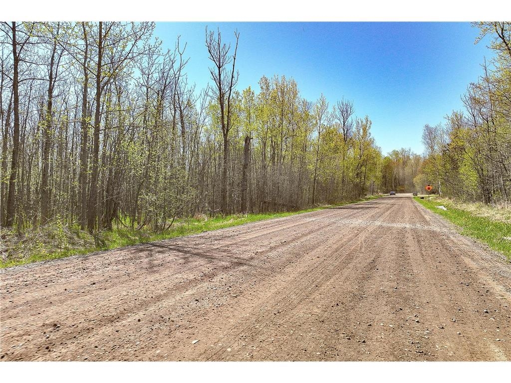 Fayre Road Duluth, MN 55803 - Photo 12 of 12 View of dirt / gravel road featuring a wooded view