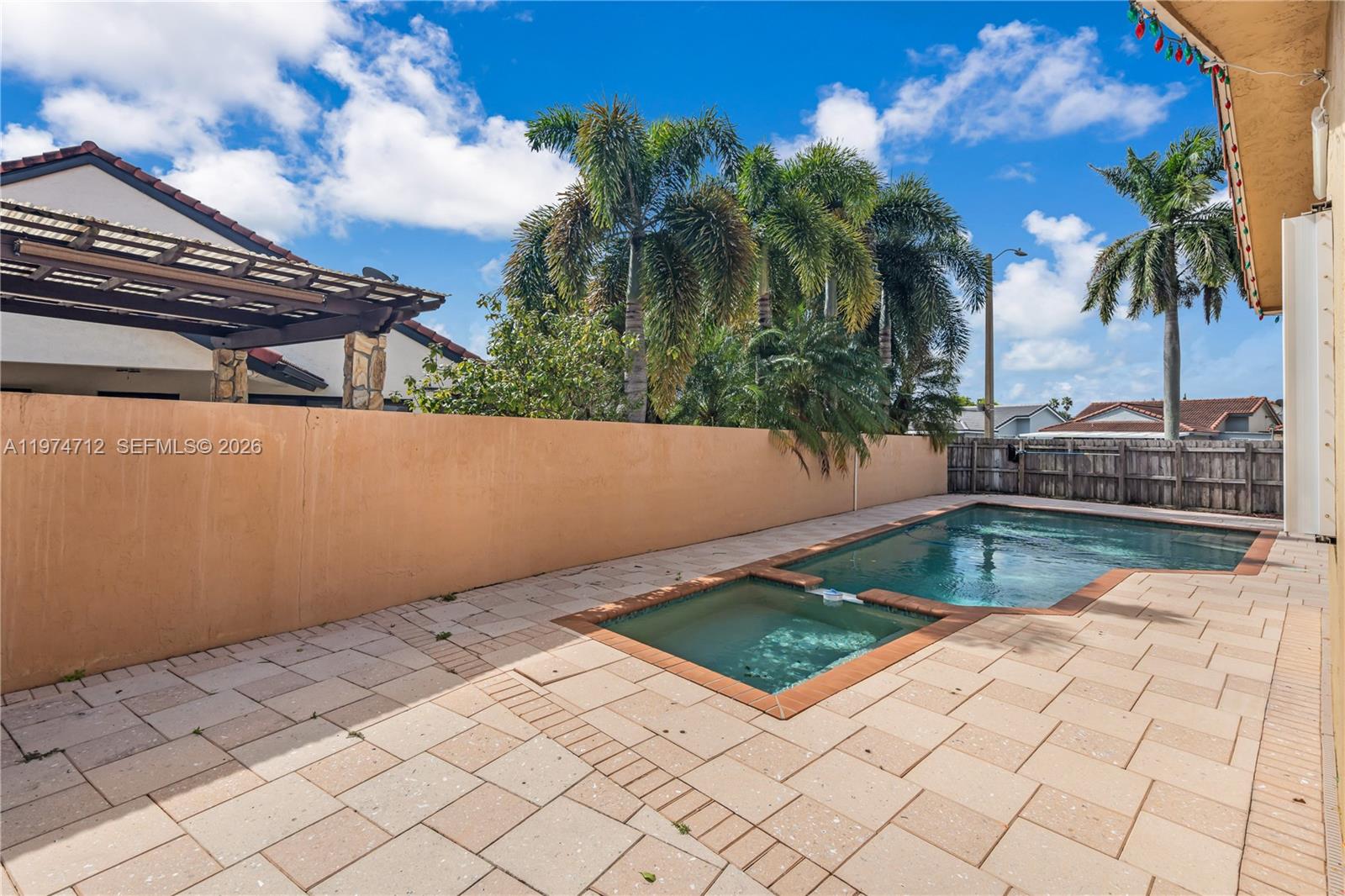 12775 Southwest 59th Street Miami, FL 33183 - Photo 2 of 18 a view of a backyard