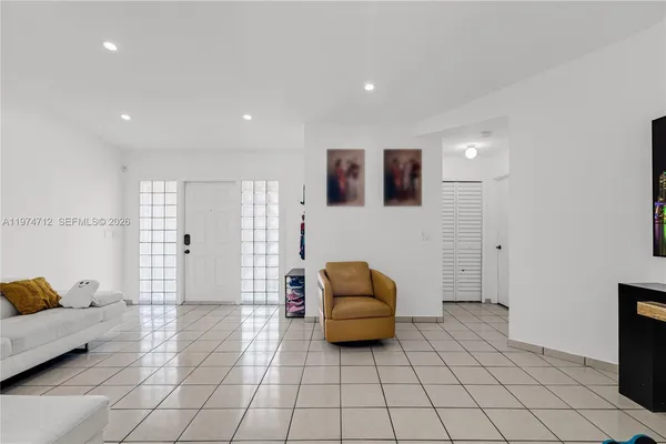 a living room with furniture and a couch