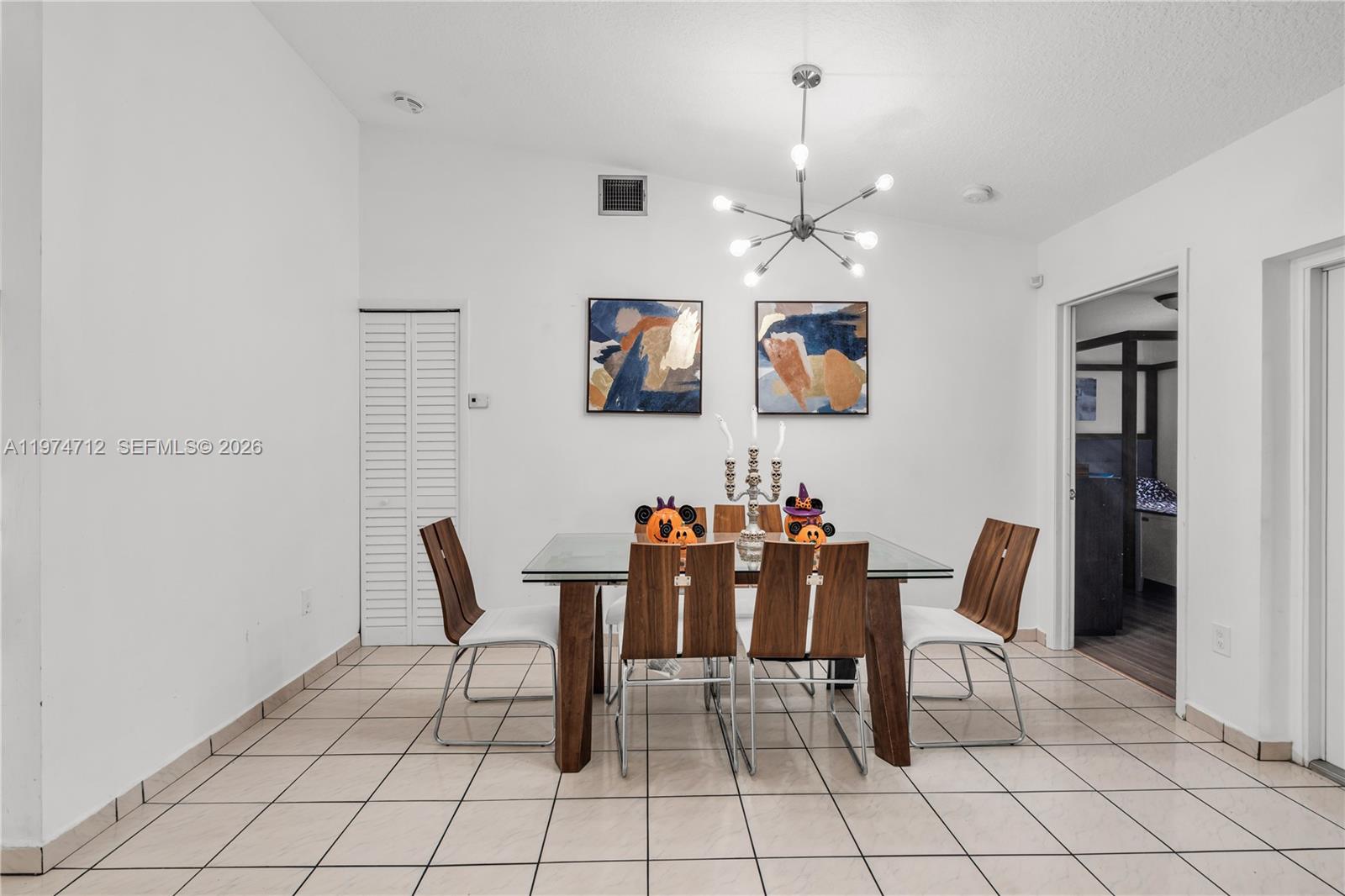 12775 Southwest 59th Street Miami, FL 33183 - Photo 7 of 18 a view of a dining room with furniture
