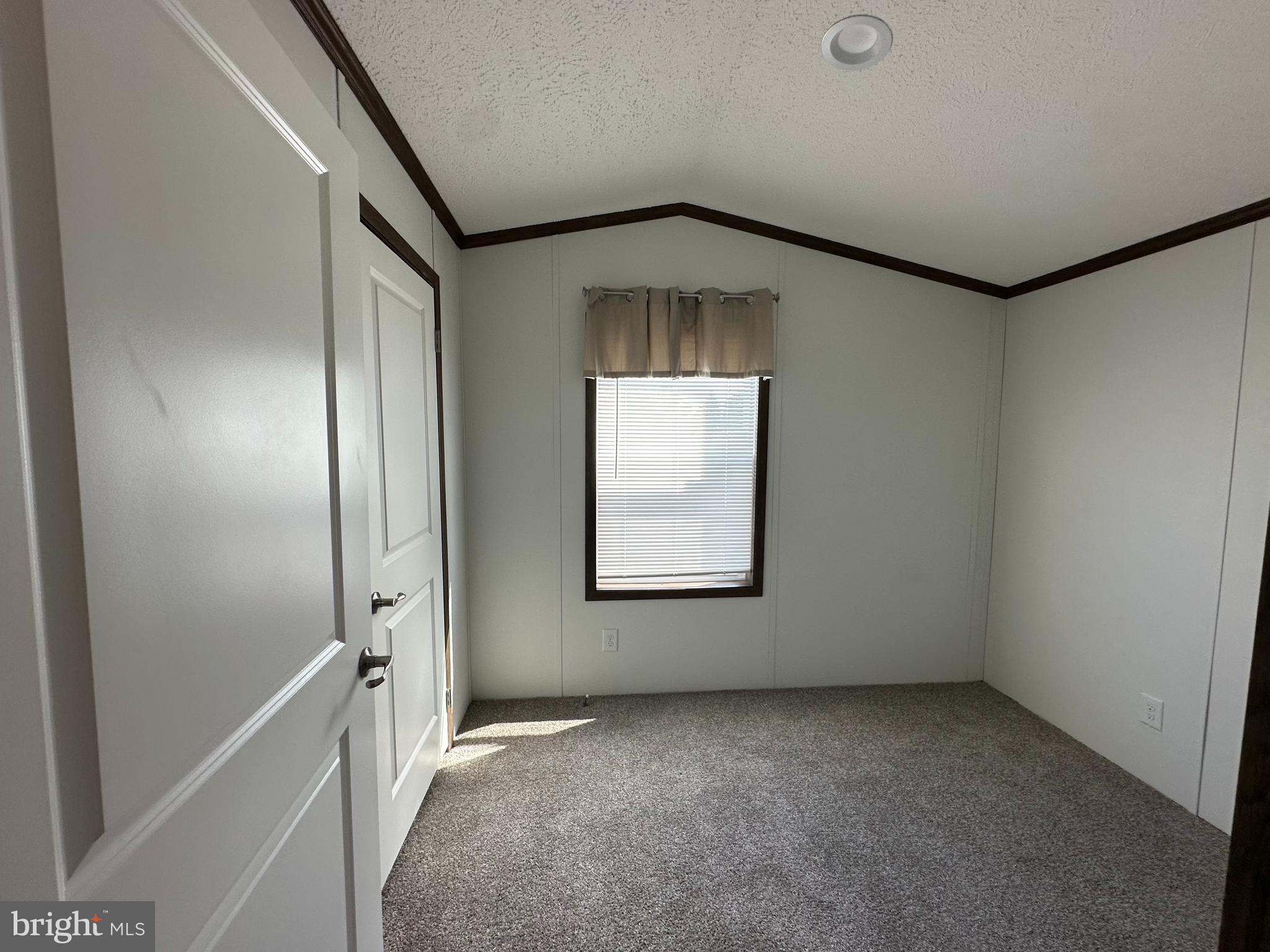 4540 Rolo Court Mechanicsburg, PA 17055 - Photo 10 of 11 an empty room with windows and closet