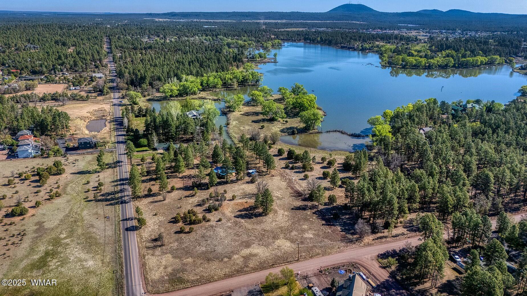Xxx Larson Road Lakeside, AZ 85929 - Photo 20 of 45 an aerial view of a house with a lake view