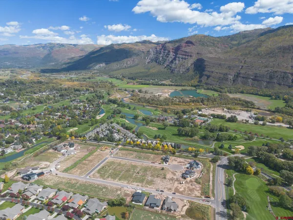 a view of a city with mountains