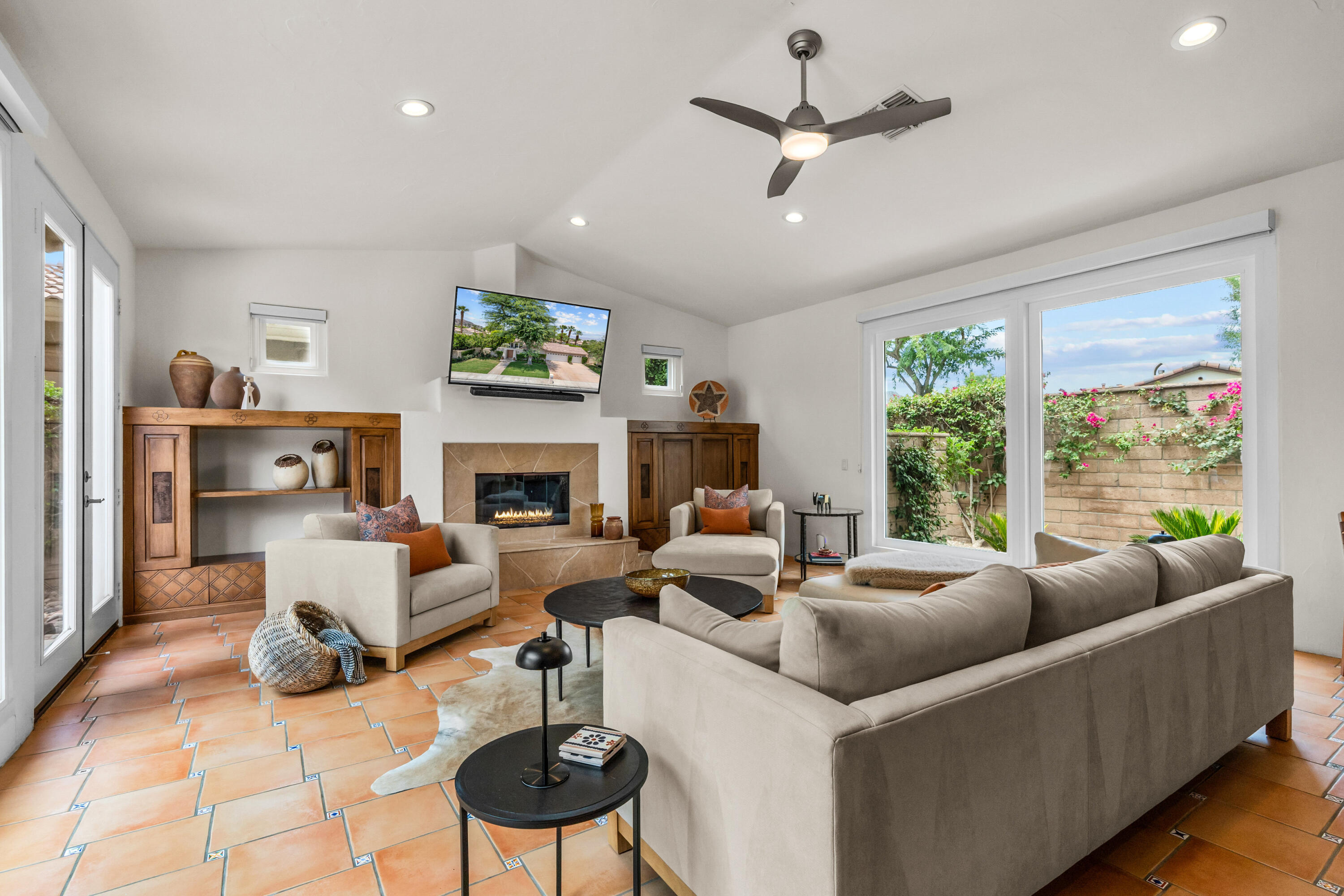 78900 Rio Seco La Quinta, CA 92253 - Photo 18 of 48 a living room with furniture fireplace and a large window