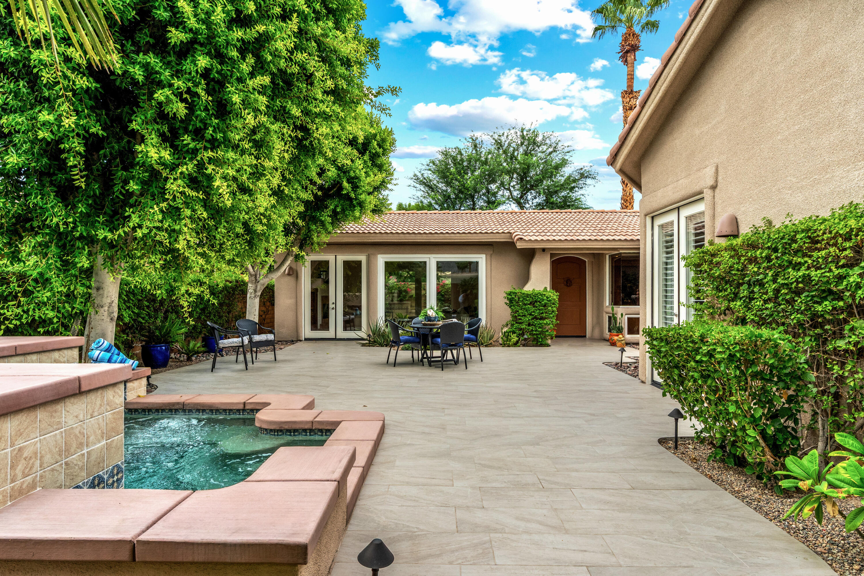 78900 Rio Seco La Quinta, CA 92253 - Photo 32 of 48 a view of house with backyard and sitting area