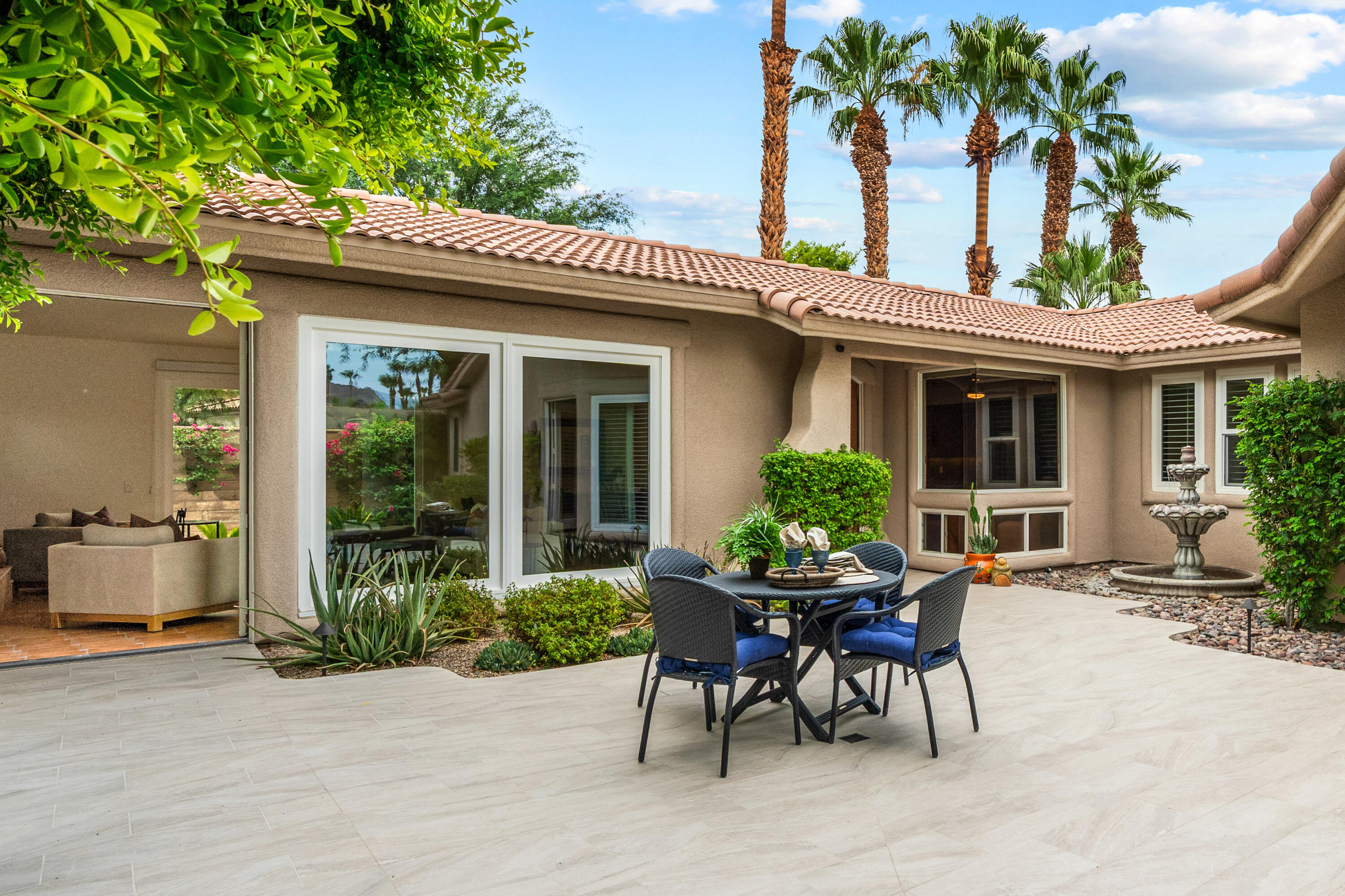 78900 Rio Seco La Quinta, CA 92253 - Photo 34 of 48 a view of a house with a patio and a yard