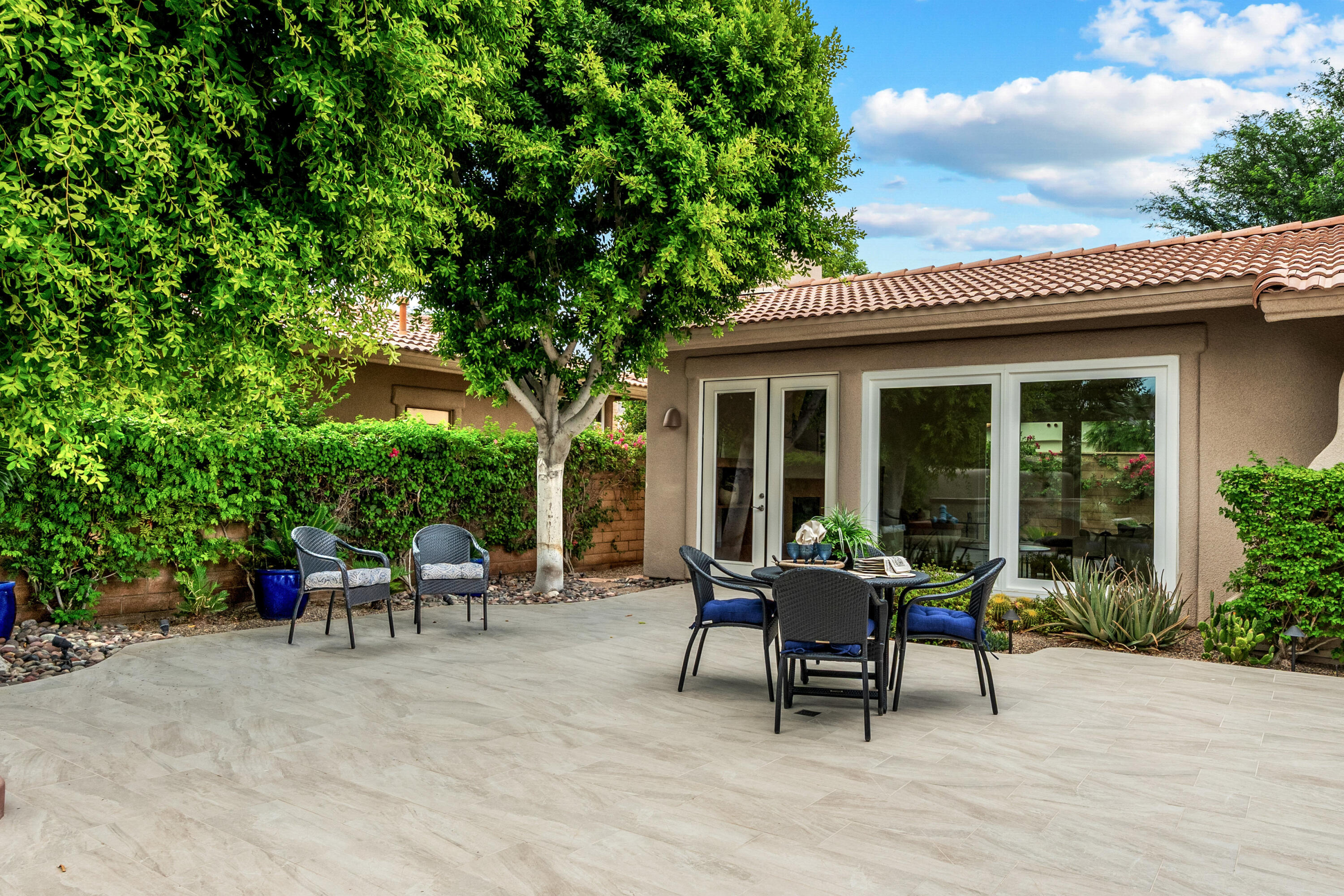78900 Rio Seco La Quinta, CA 92253 - Photo 35 of 48 a view of a house with backyard sitting area and garden