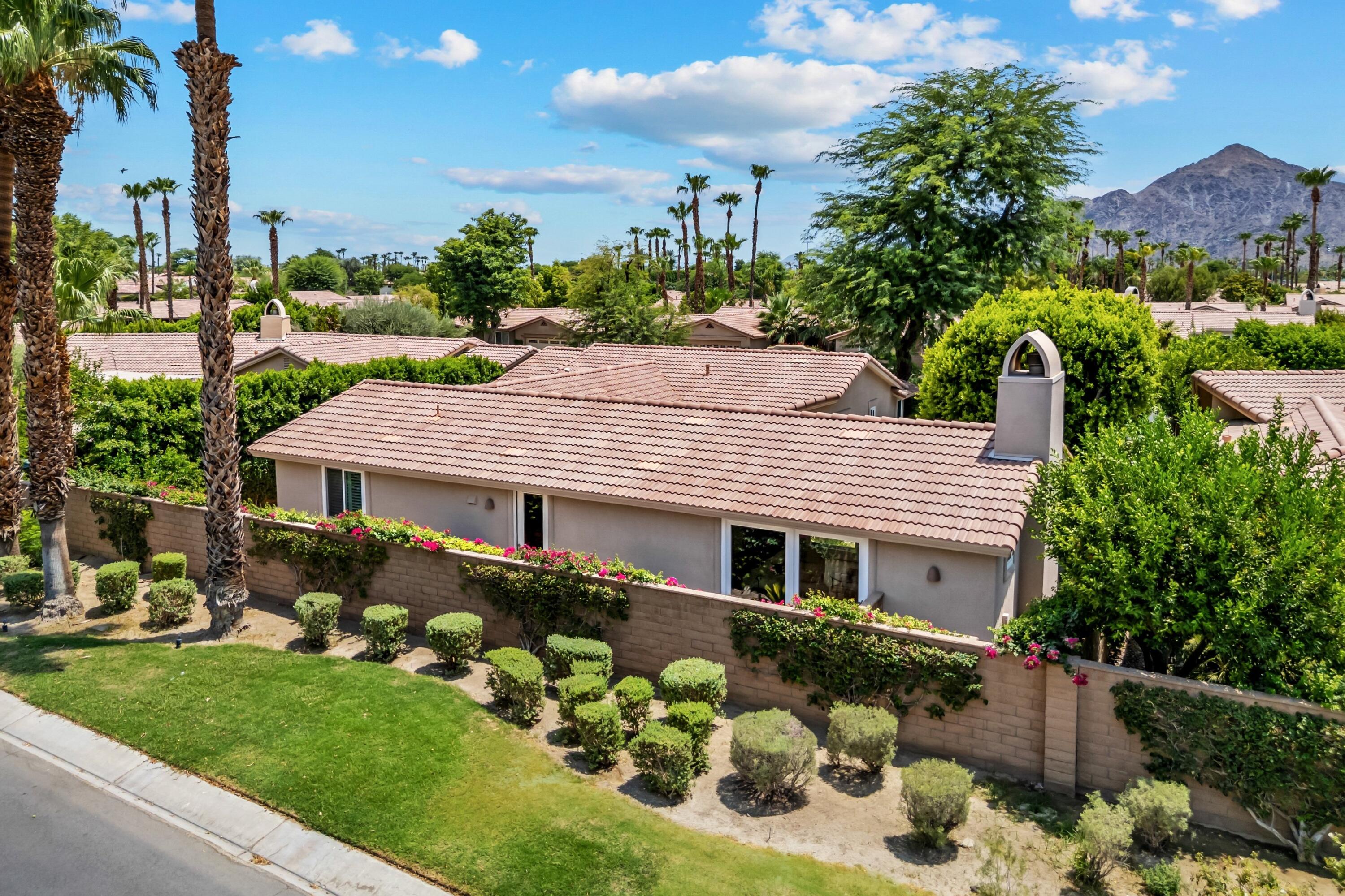 78900 Rio Seco La Quinta, CA 92253 - Photo 44 of 48 a front view of a house with a garden