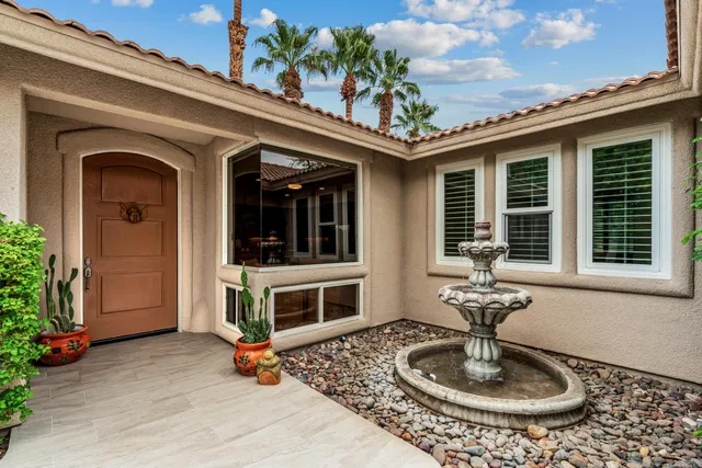 a front view of a house with entertaining space