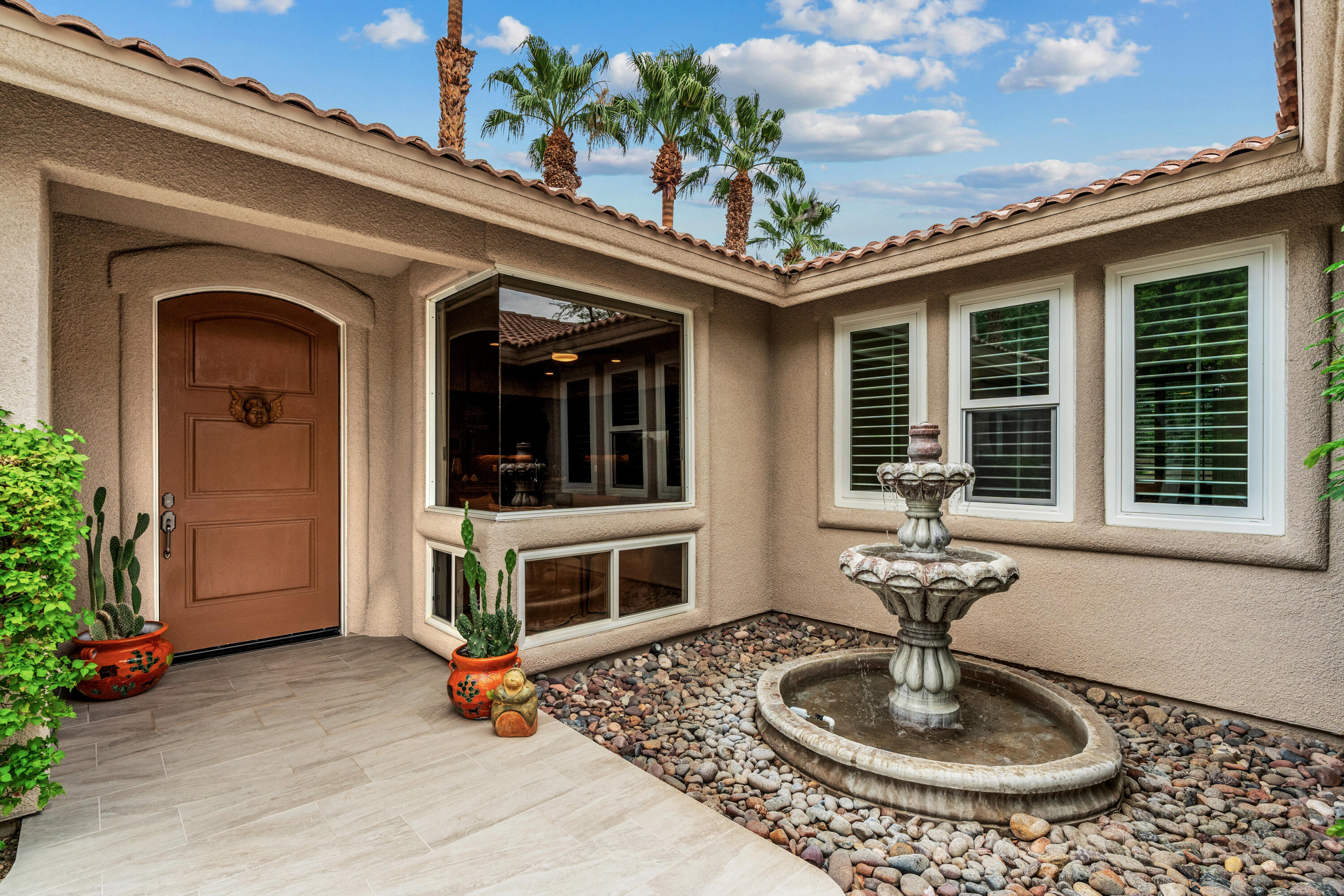 78900 Rio Seco La Quinta, CA 92253 - Photo 6 of 48 a front view of a house with entertaining space