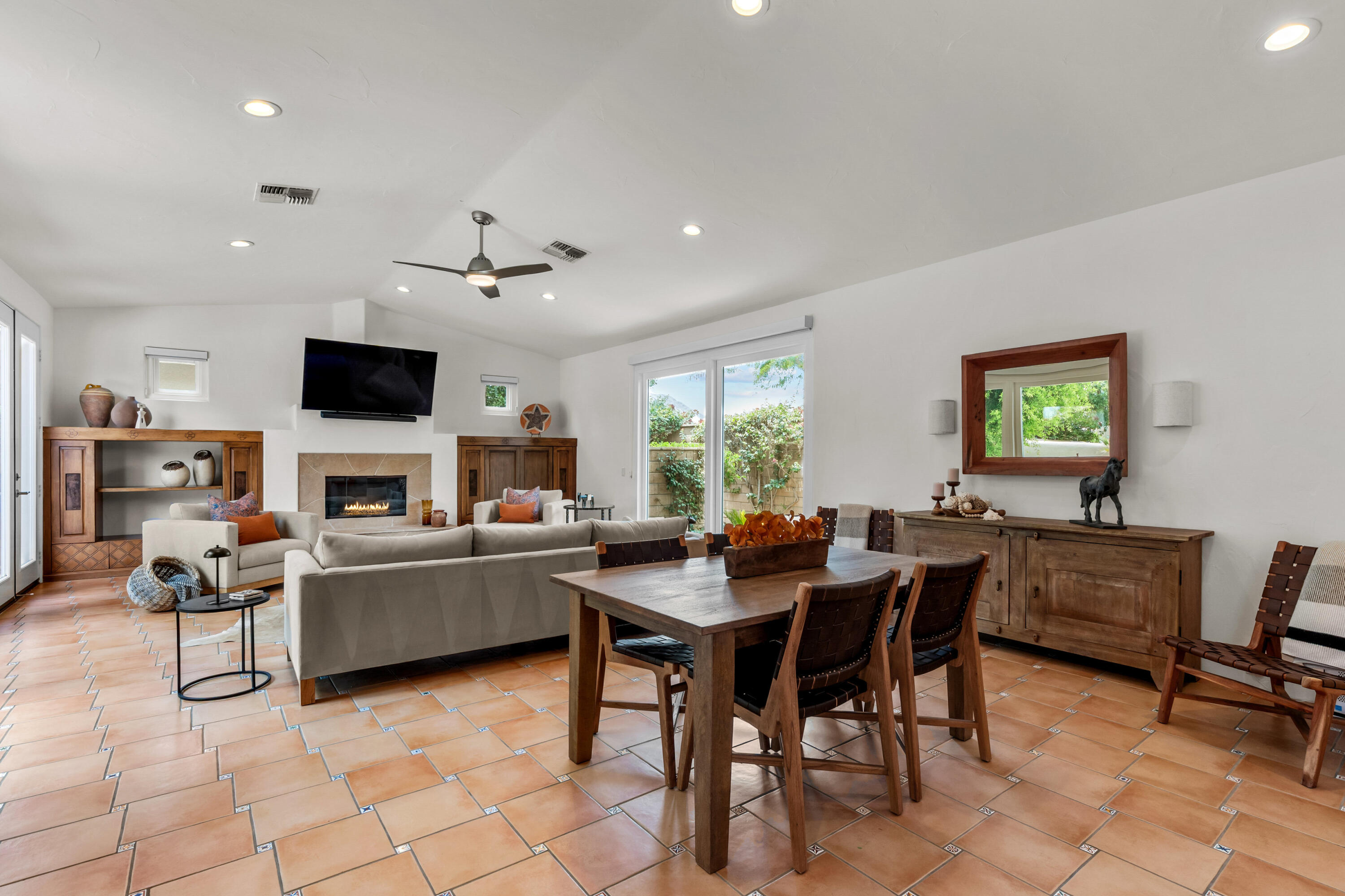 78900 Rio Seco La Quinta, CA 92253 - Photo 9 of 48 a view of a workspace with furniture and a fireplace