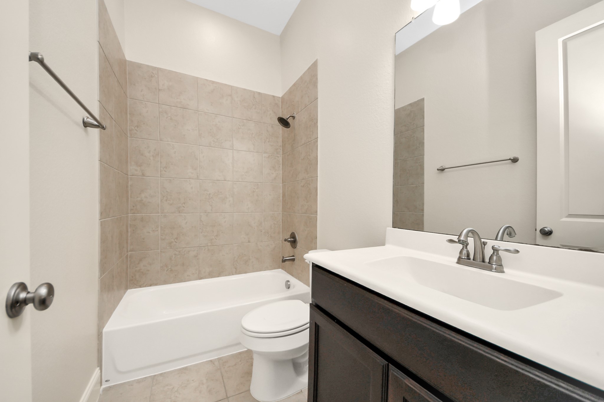 9814 Carver Drive Rosharon, TX 77583 - Photo 16 of 34 Each bedroom comes with an ensuite bathroom.