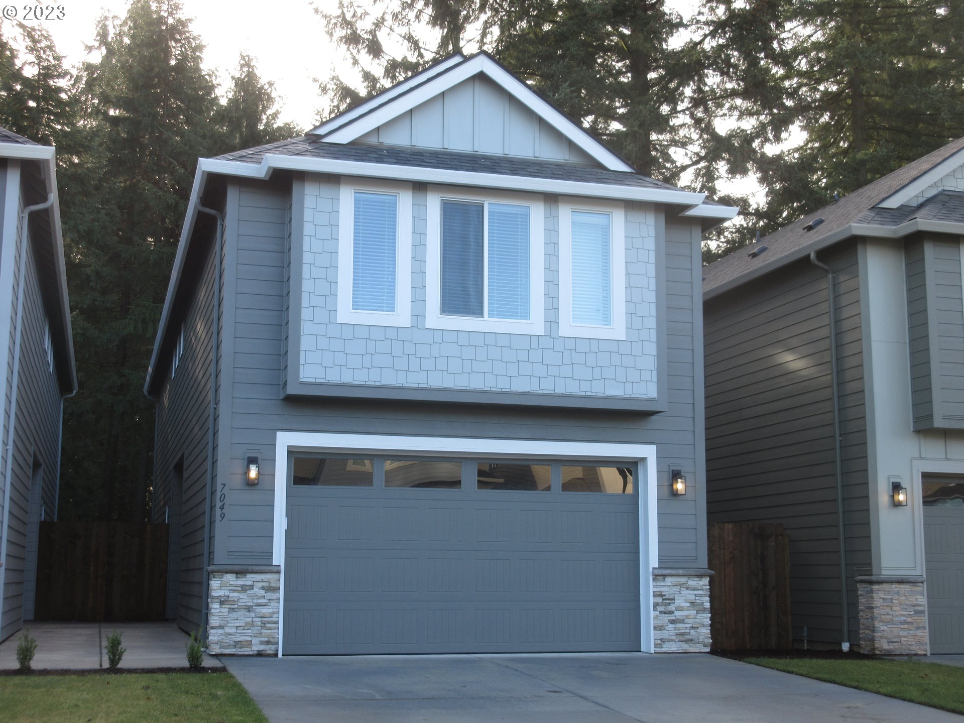 7049 South 13th Street Ridgefield, WA 98642 - Photo 1 of 33 a front view of house with yard