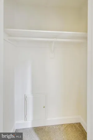 a bathroom with a tub sink shower and mirror