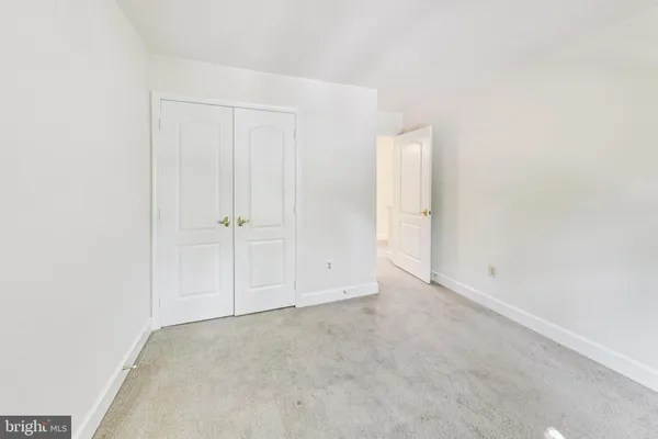 a view of a house with wooden deck