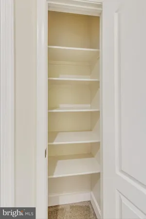 a front view of a house with yard and staircase