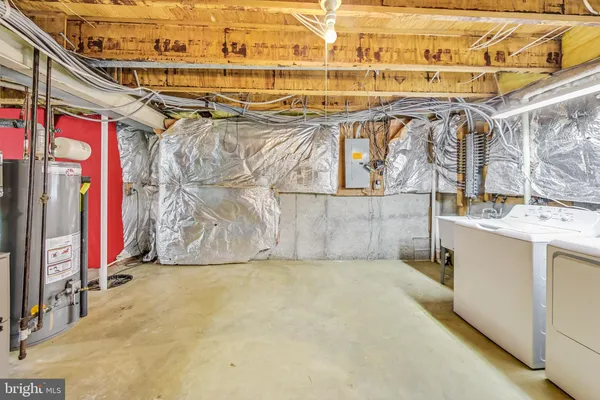 front view of a house with a tree