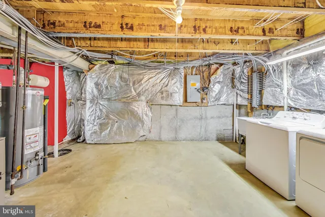 front view of a house with a tree