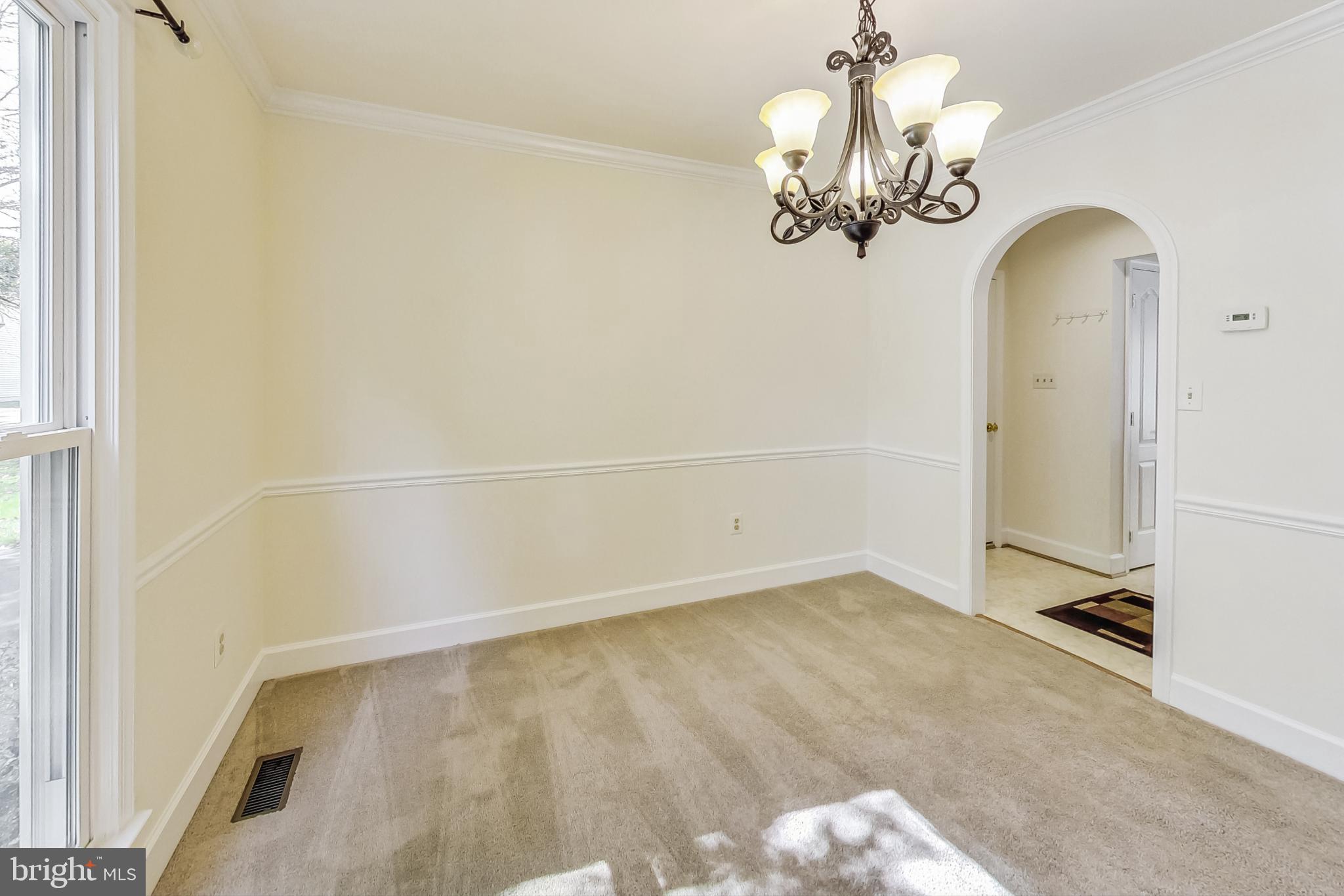 6104 Cool Spring Terrace South Frederick, MD 21701 - Photo 9 of 67 a view of a chandelier in big room with chandelier fan
