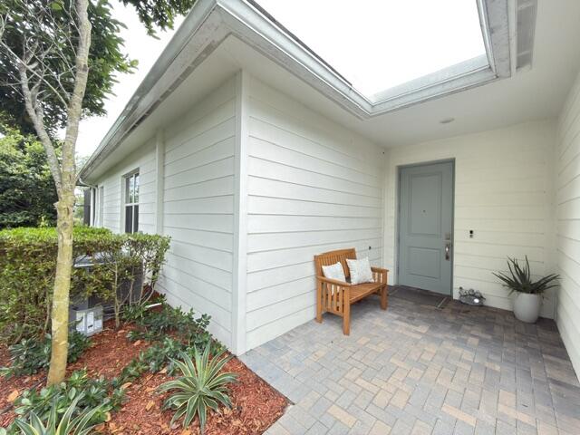 19696 Weathervane Way Loxahatchee, FL 33470 - Photo 1 of 39 a backyard of a house with outdoor seating