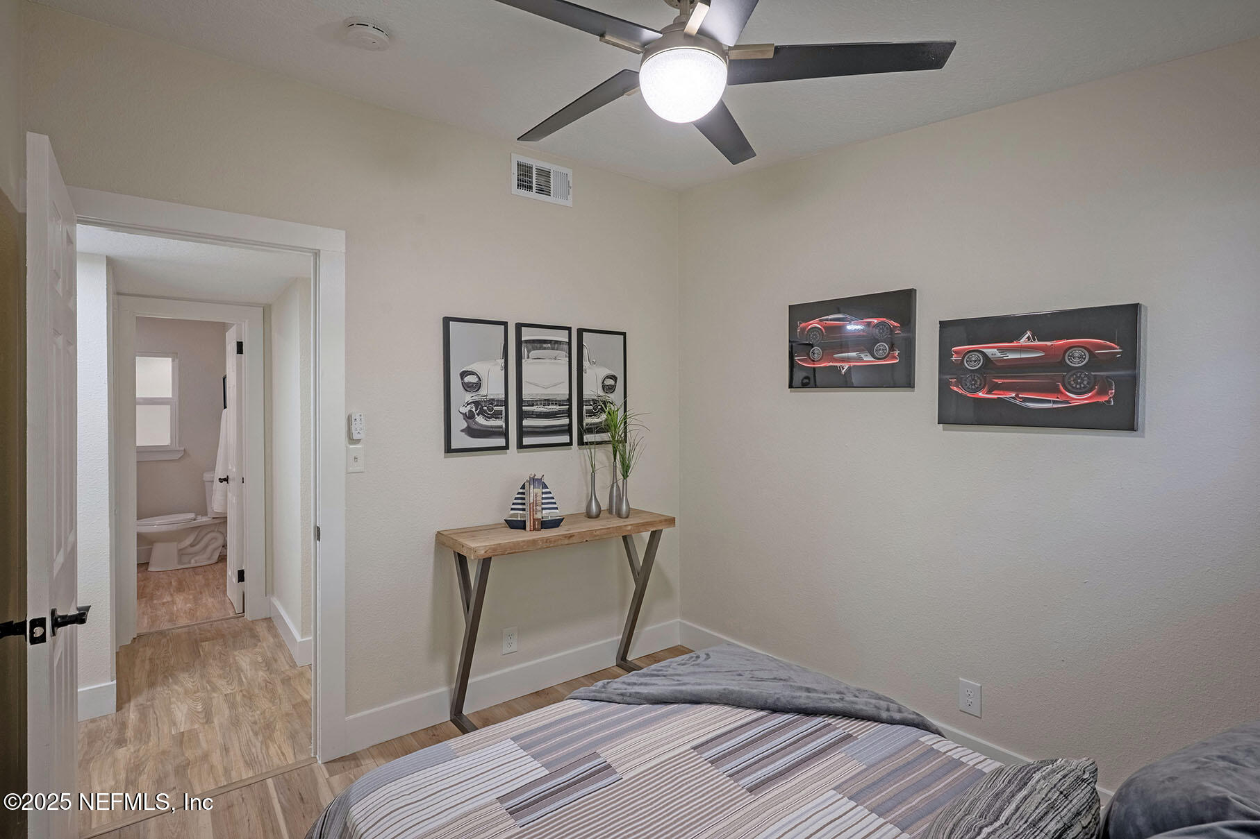 571 Hopkins Street Neptune Beach, FL 32266 - Photo 26 of 63 a view of a hallway with wooden floor and workspace