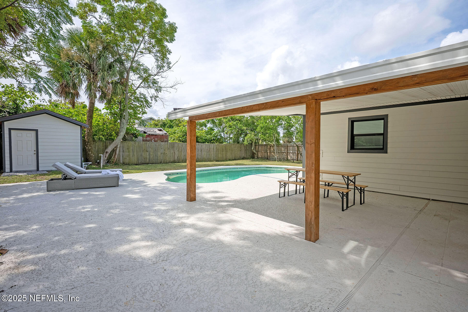 571 Hopkins Street Neptune Beach, FL 32266 - Photo 4 of 63 a view of a porch with backyard
