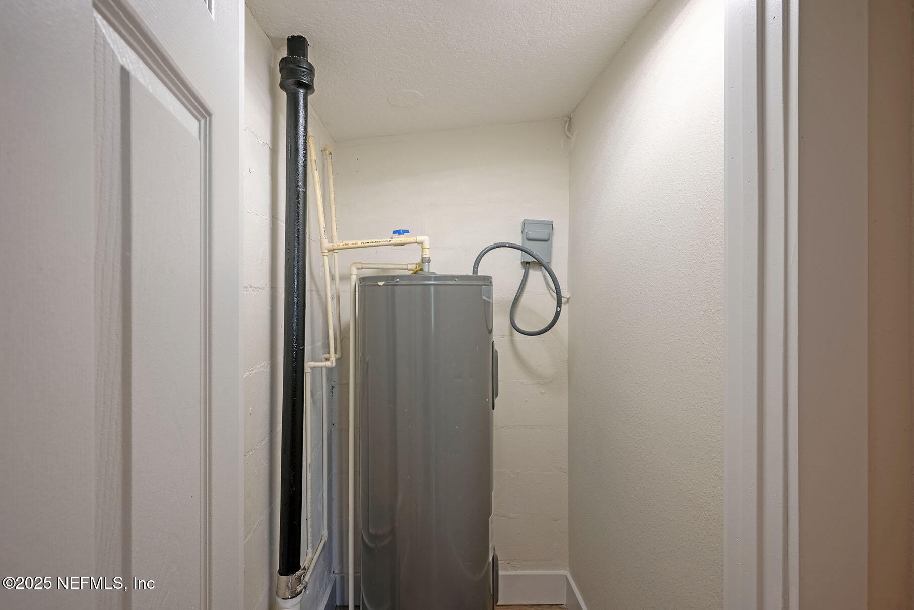 571 Hopkins Street Neptune Beach, FL 32266 - Photo 44 of 63 a bathroom with a shower