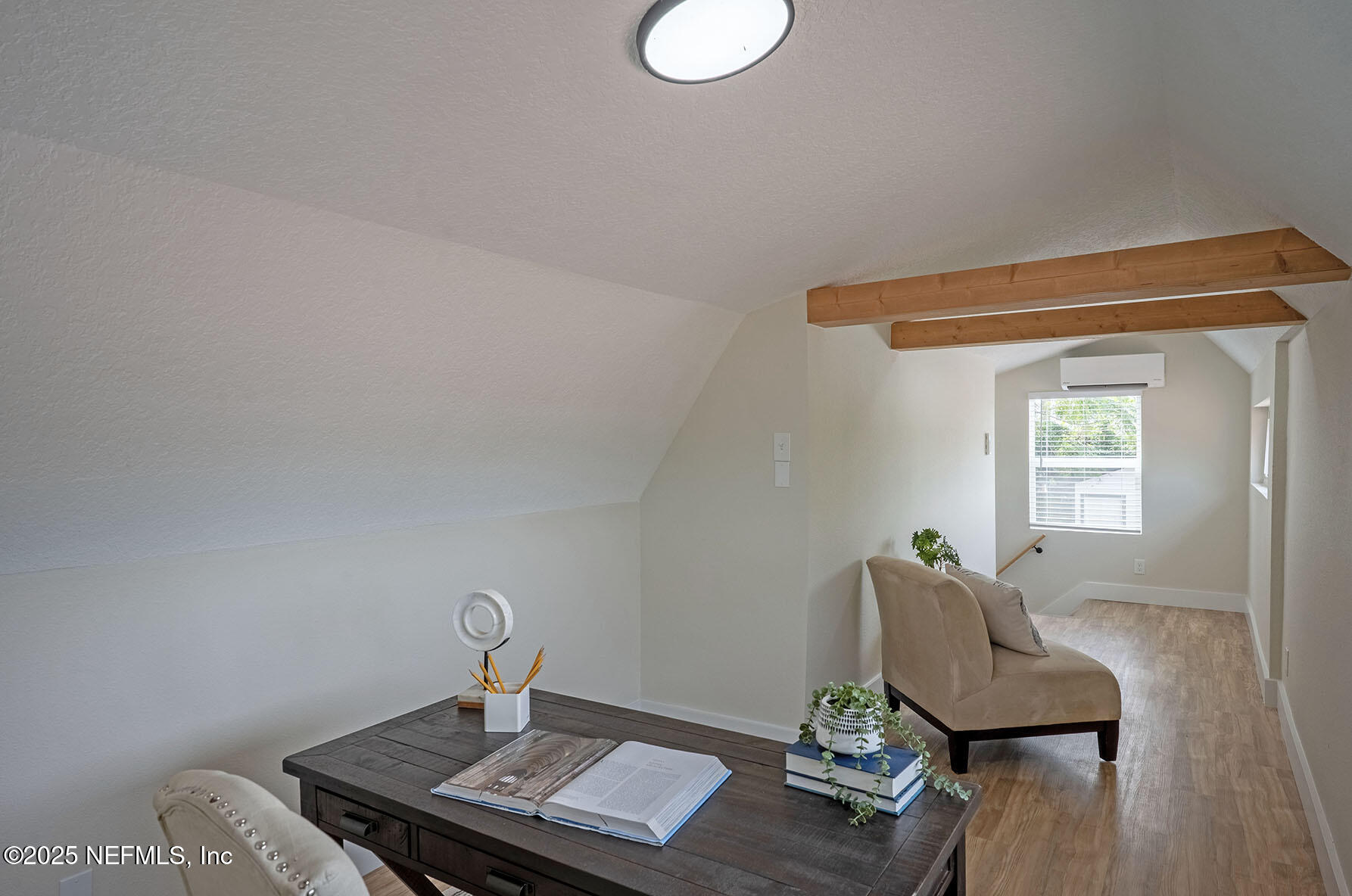 571 Hopkins Street Neptune Beach, FL 32266 - Photo 59 of 63 a living room with couch and a window
