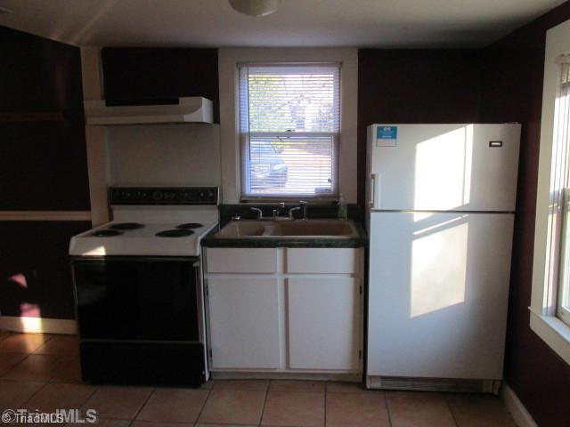 2006 Pope Road Winston-Salem, NC 27127 - Photo 2 of 16 Kitchen. Kitchen with all appliances to remain and tile floors