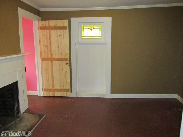 2006 Pope Road Winston-Salem, NC 27127 - Photo 4 of 16 Living Room. Living room with hardwood floors --- appears some floor repairs have been made at some point