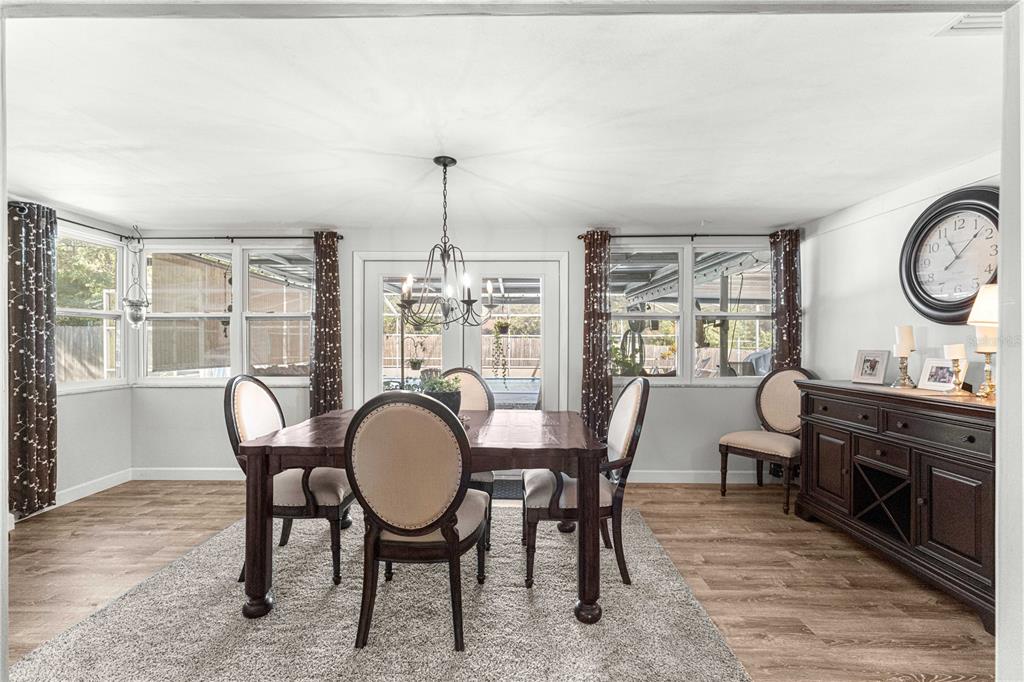 6401 East Holly Street Inverness, FL 34452 - Photo 24 of 51 a view of a dining room with furniture window and wooden floor