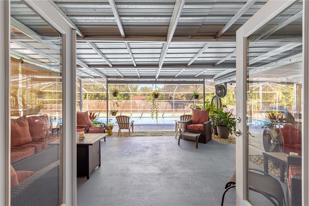 6401 East Holly Street Inverness, FL 34452 - Photo 29 of 51 a room with furniture and a large window