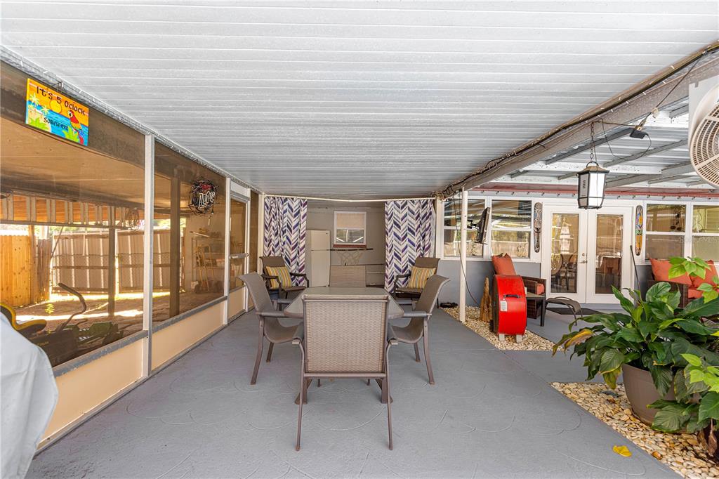 6401 East Holly Street Inverness, FL 34452 - Photo 34 of 51 a lobby with furniture and floor to ceiling window