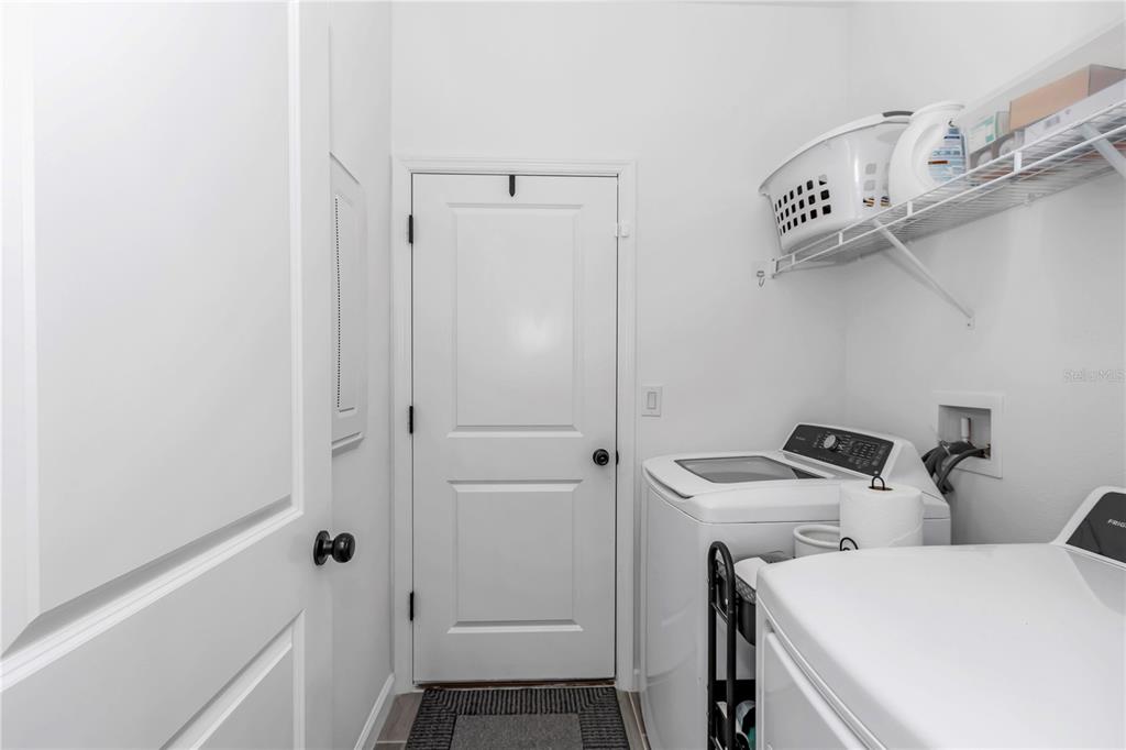 7651 Southwest 74th Loop Ocala, FL 34481 - Photo 34 of 47 a utility room with dryer and washer